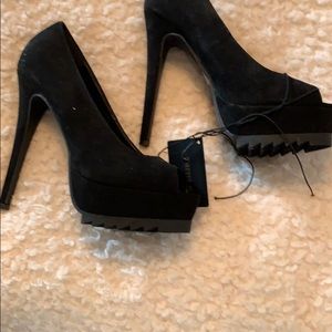 Black spike peek a boo toe shoes